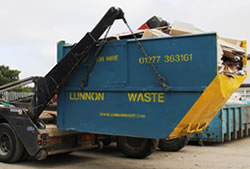 Skip Hire Epping unloading a full skip